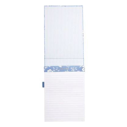 open flip notebook showing lined pages inside