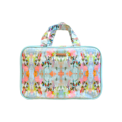 cosmetic bag with an ink blot design in vibrant hues of pink, orange, blue, and green shown on a white background