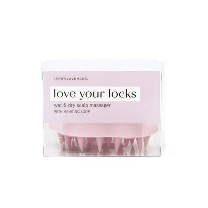 pink Love Your Locks Wet & Dry Scalp Massager displayed in the package against a white background