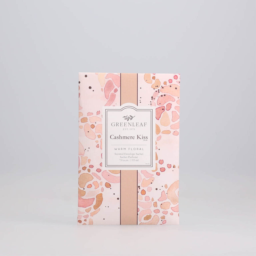 Cashmere Kiss Large Sachet printed with hues of orange and pink swirls displayed against a grey background.