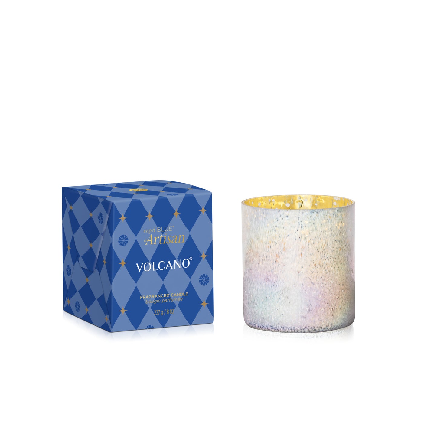 Volcano Artisan Winter Bazaar Tumbler Candle and its box on a white background