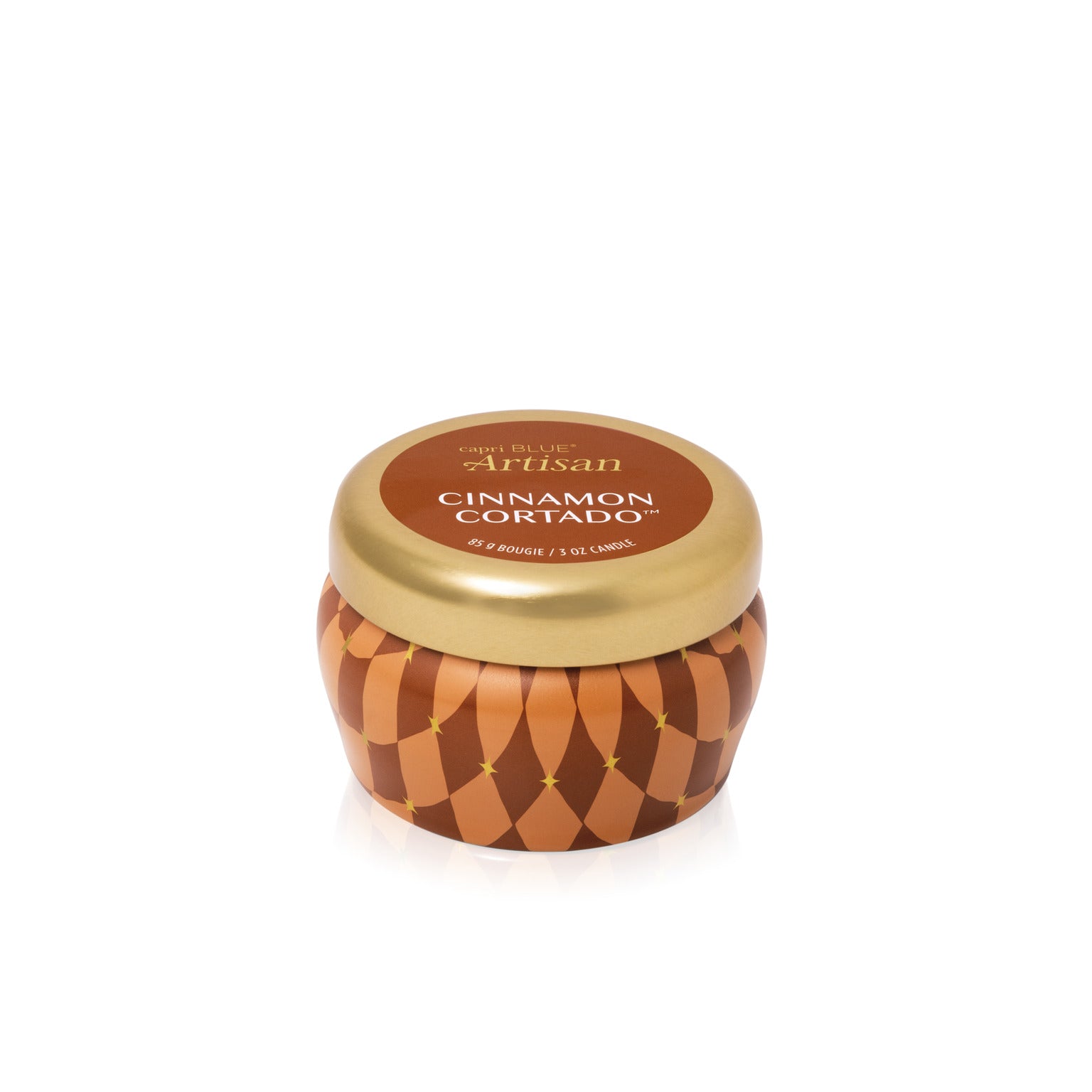 angled view of the Cinnamon Cortado Artisan Winter Bazaar Mini Tin Candle with its lid on 
