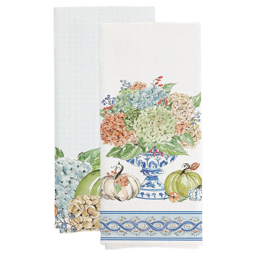 2 fall themed tea towels with hydrangeas and pumpkins on them