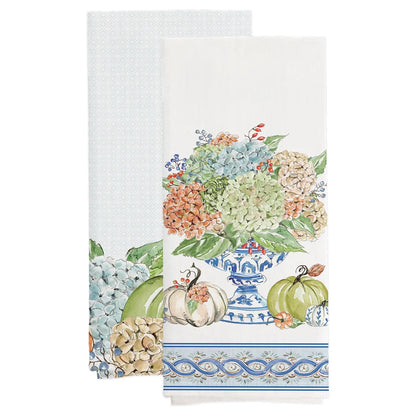 2 fall themed tea towels with hydrangeas and pumpkins on them