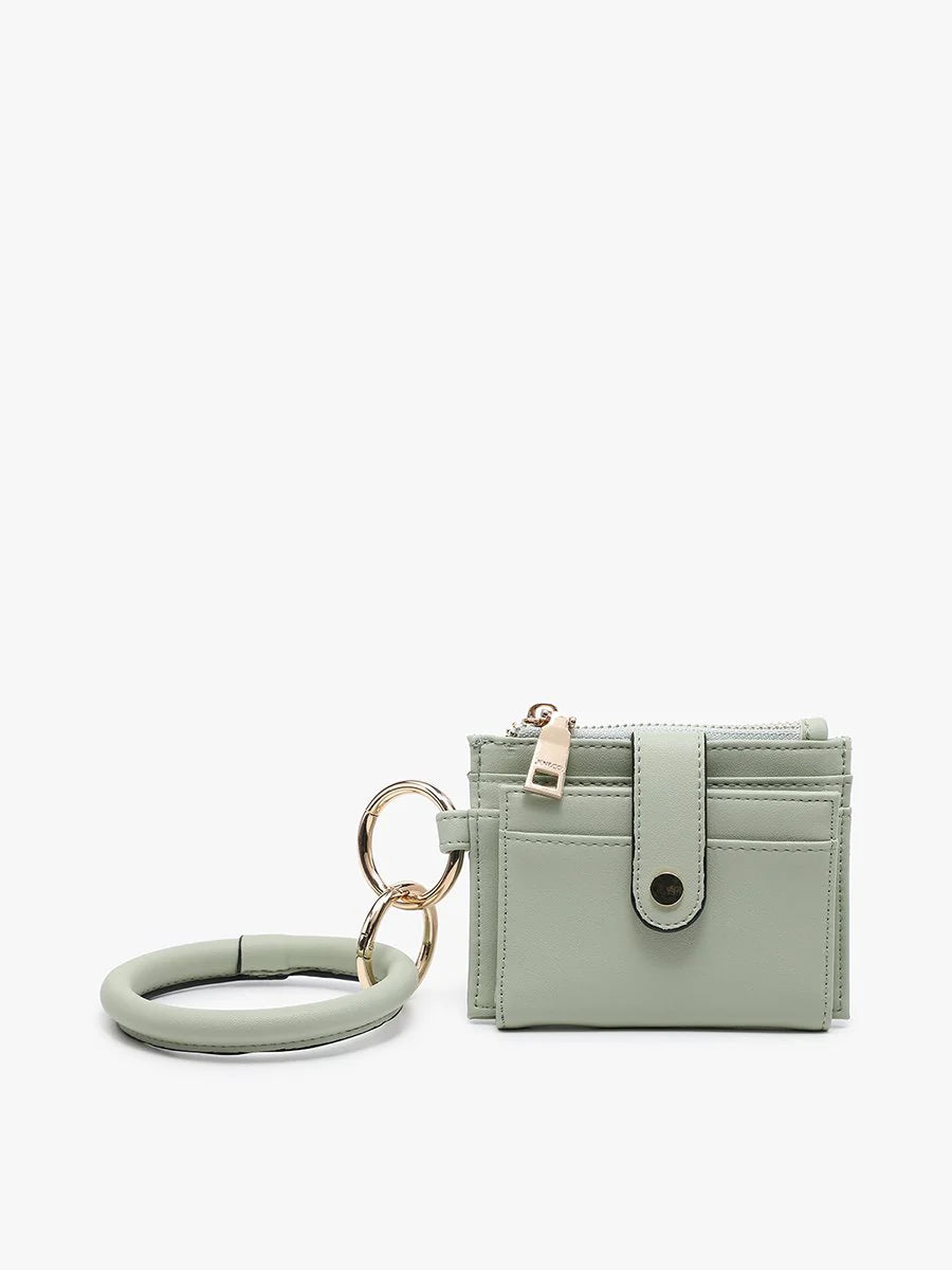 sage Mini Snap Wallet Wristlet with o-ring bangle on a white background.