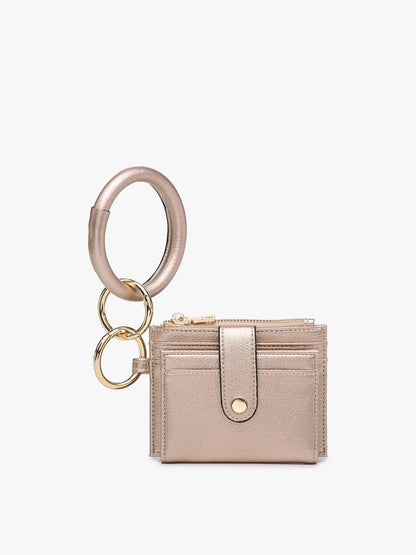 rose gold Mini Snap Wallet Wristlet with o-ring bangle on a white background.