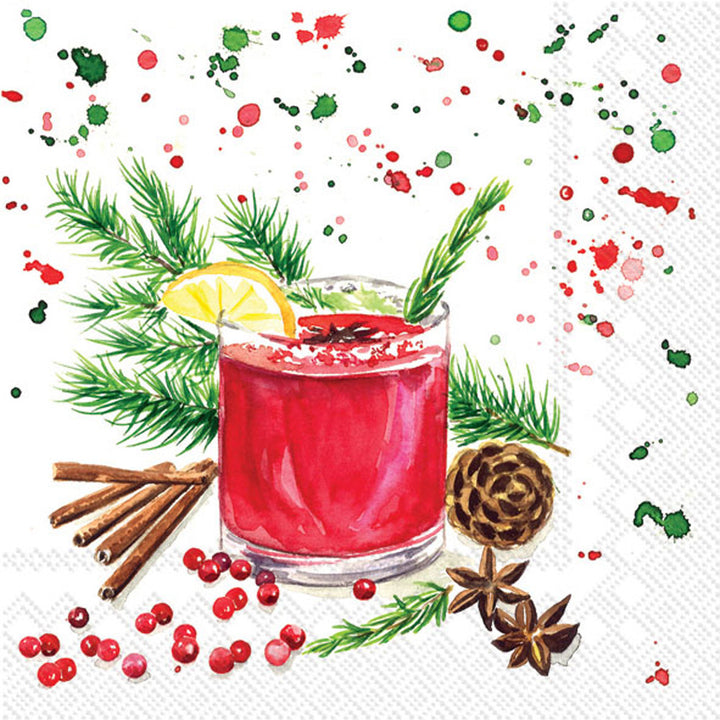Decorative paper napkin with a red drink, cinnamon, and Christmas elements on a white background.