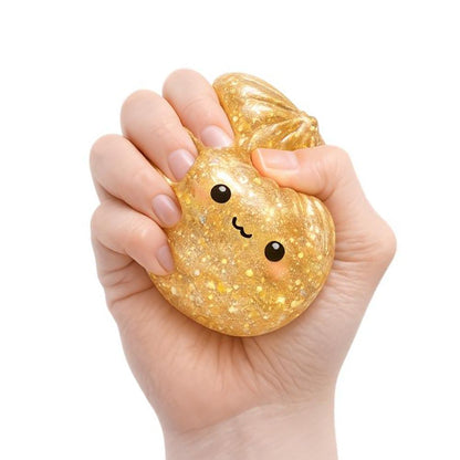 a gold bao being squished