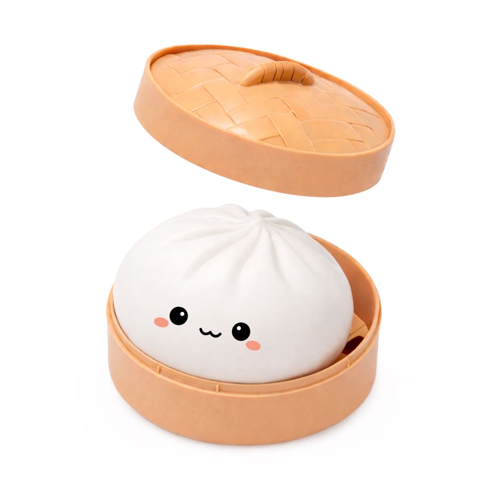 a white bao in is bamboo like steamer container