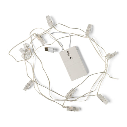 Photo Clip Strand turn off and arranged on a white background