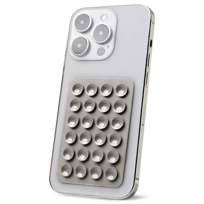 grey Tentacle Tech Suction Phone Mount stuck on back of phone