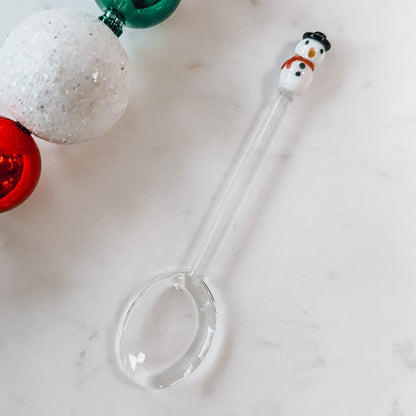 Glass Christmas spoon with snowman top.