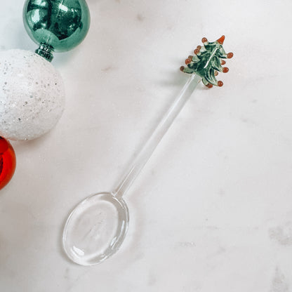 Glass Christmas spoon with tree shaped top.