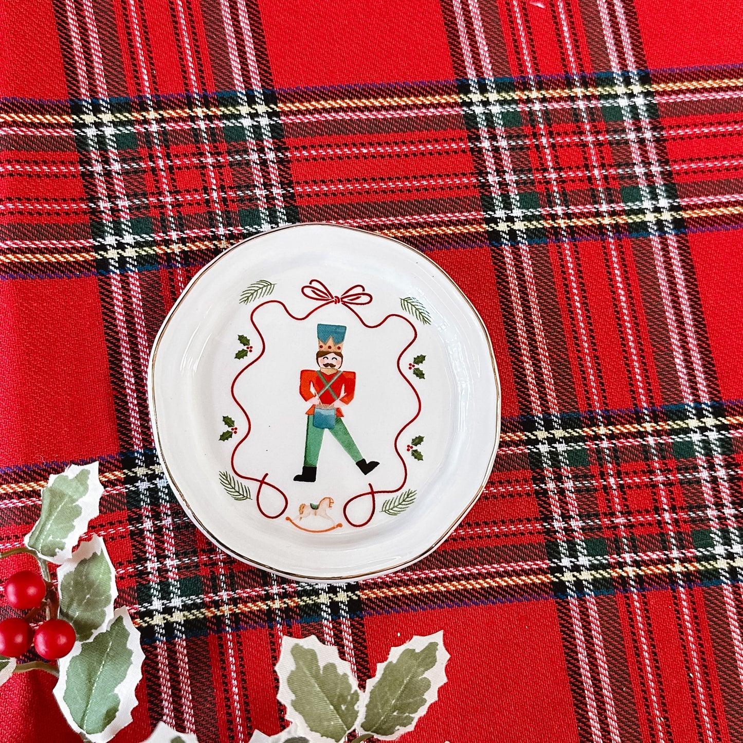 Tidbit dish with a nutcracker holding a drum.