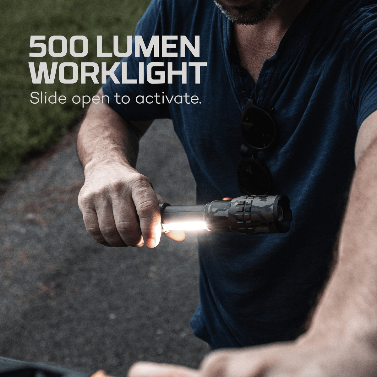 person holding flashlight to illuminate what they are looking at