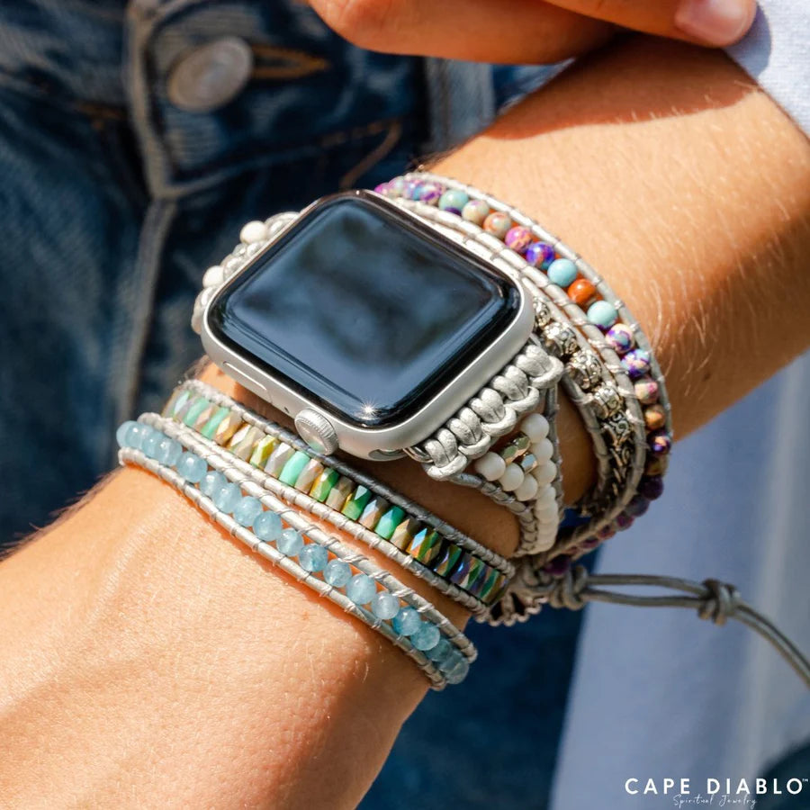 close-up of person's wrist wearing Ocean Jasper strap on an apple watch.