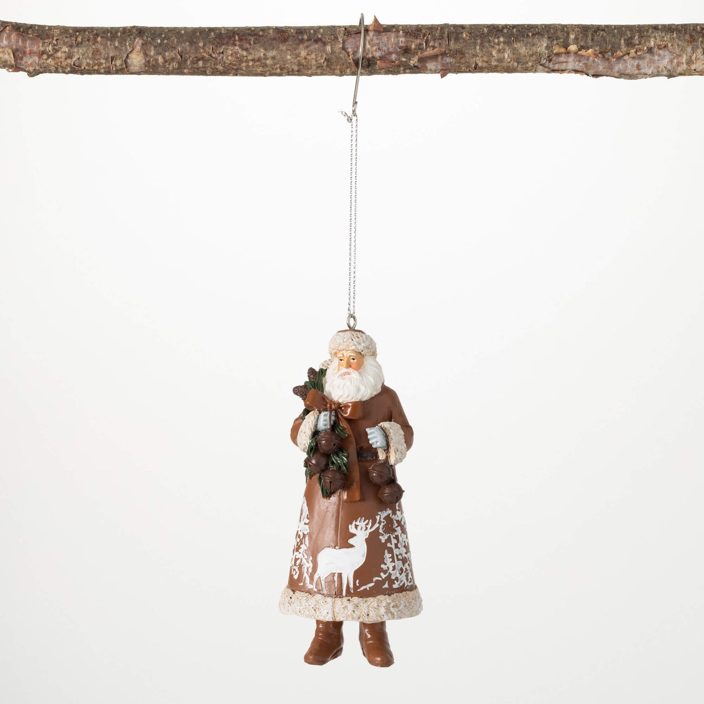 woodland santa ornament hanging from a branch against a white background