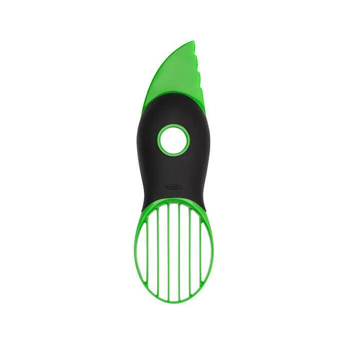 green and black avocado slicer.