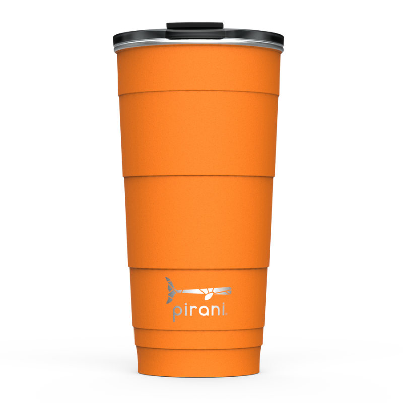orange tumbler with silver pirani logo near the bottom of cup and a lid on it shown a white background.