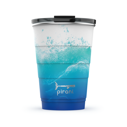 Tsunami tumbler with silver pirani logo near the bottom of cup and a lid on it shown a white background.