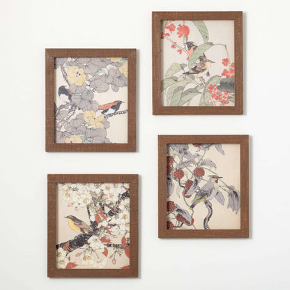 all four styles of framed bird artwork hanging against a white background