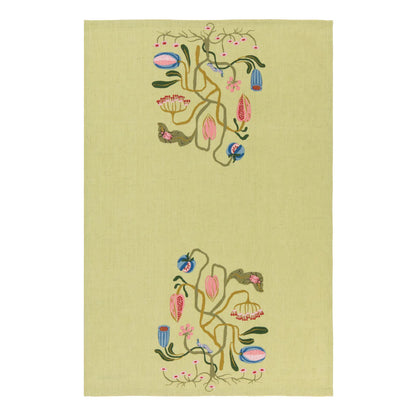 green dishtowel with floral design in the center of the top and bottom