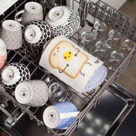 funny foods Swedish Sponge Dishcloth laying in a dishwasher.