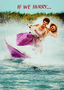front of card is two women on a pink jet ski splashing up water