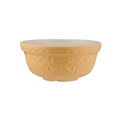 buttercup yellow mixing bowl with embossed florals and chickens on it