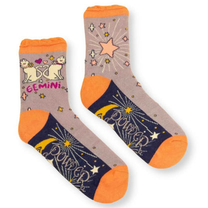 taupe gemini socks with dog design.