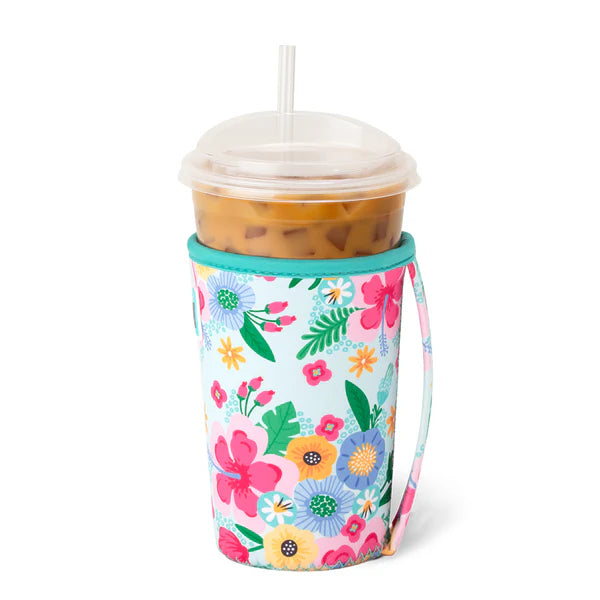 side view of island bloom cup coolie on a n iced beverage, showing side strap handle.