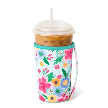 side view of island bloom cup coolie on a n iced beverage, showing side strap handle.