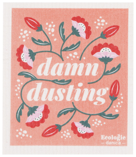 Damn Dusting Swedish Sponge Cloth is pink with white text listed in the title and red and pink flowers surrounding it