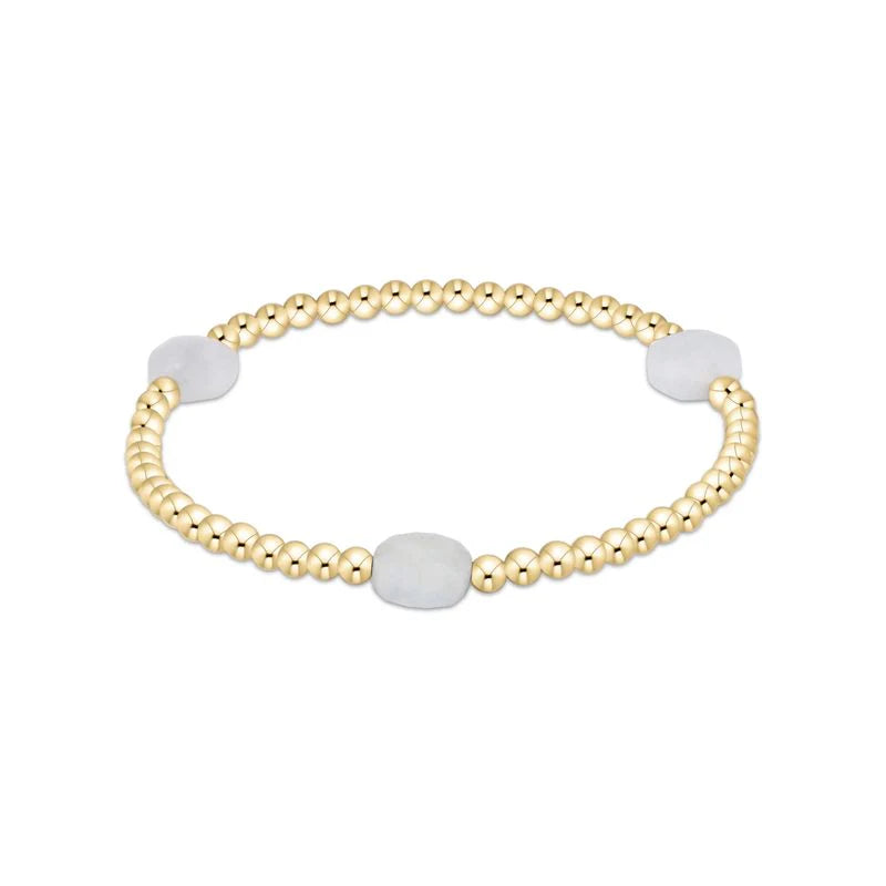 enewton Admire Gem 3mm Gold Bracelet in Aquamarine on a white background