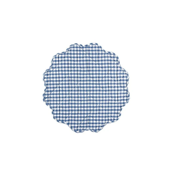 Blue and white checkered placemat with scalloped edge on a white background