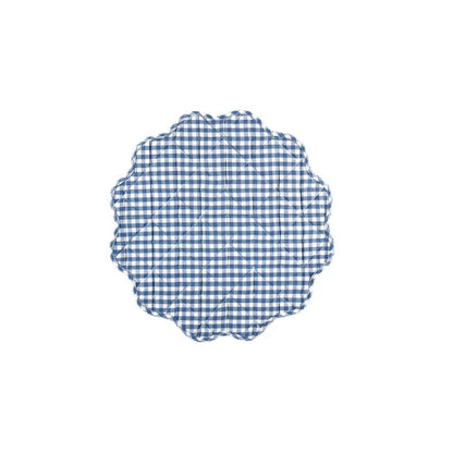 Blue and white checkered placemat with scalloped edge on a white background
