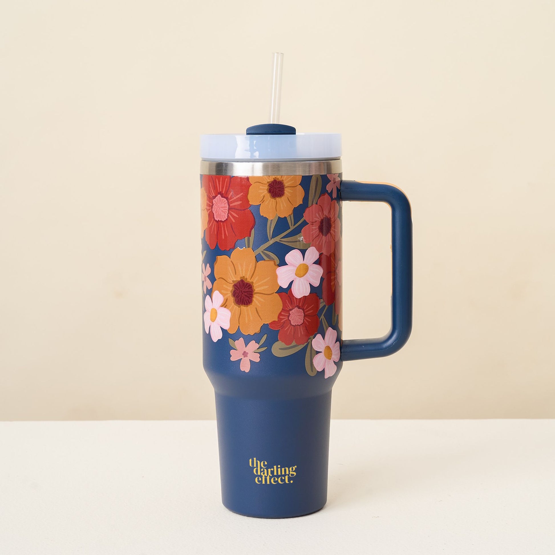 Navy 40 oz. tumbler with colorful fall flowers.