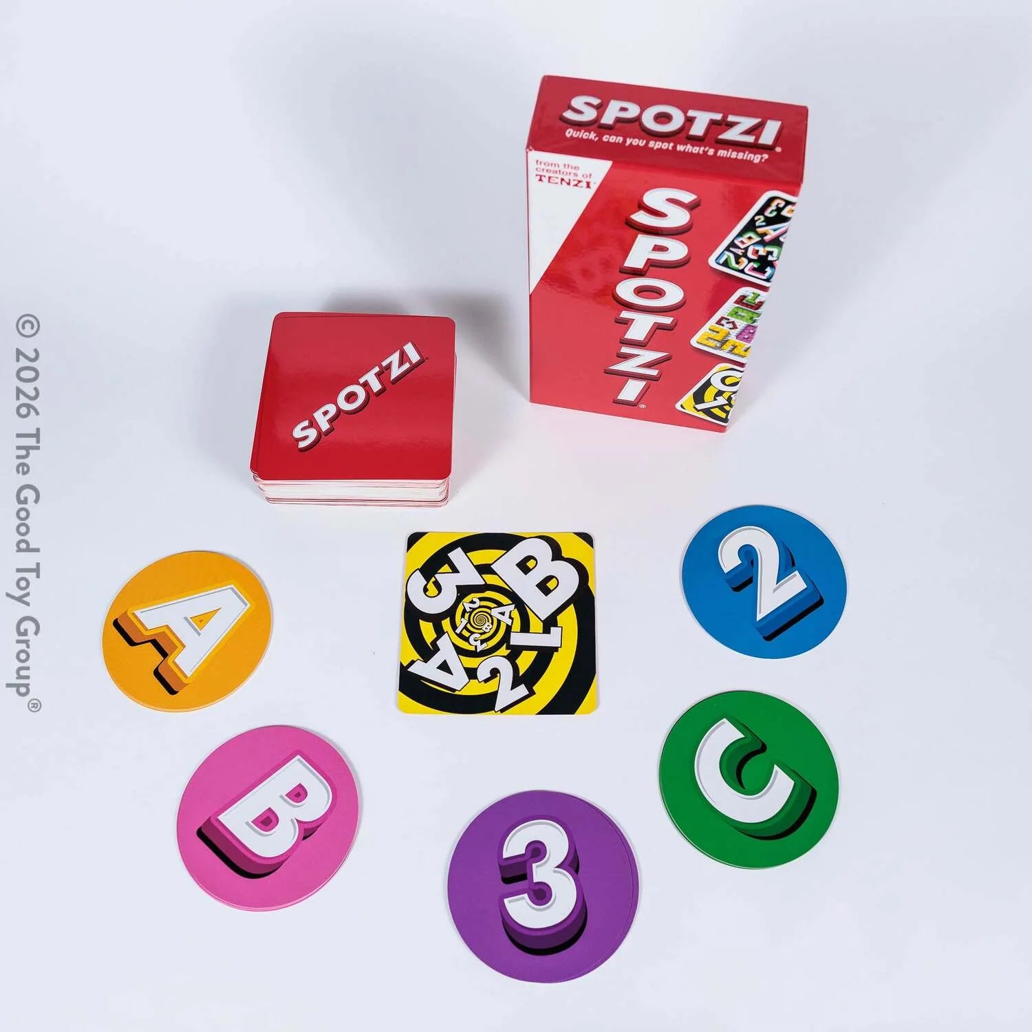 Spotzi game pieces and packaging on a white background