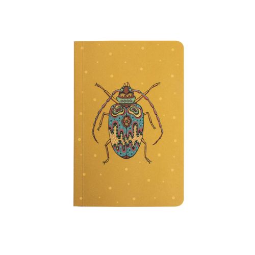 Yellow notebook with light yellow polka dots and a blue and red beetle.