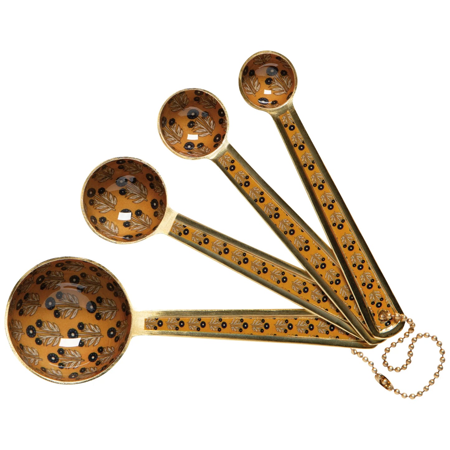 Set of decorative measuring spoons with intricate designs on a white background