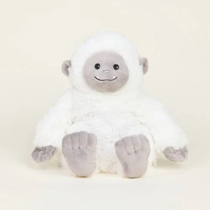 warmies yeti plush toy against a creamy white background.