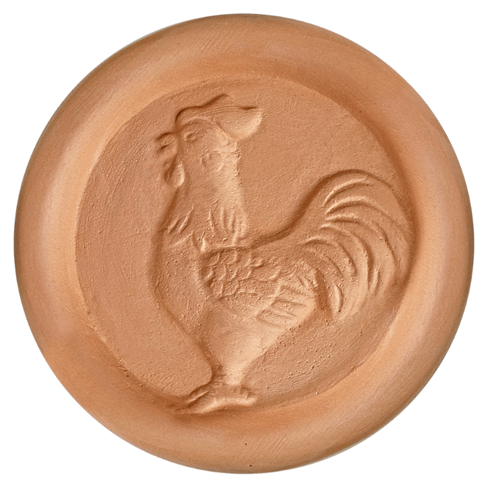 Terracotta sugar saver with a rooster design on a white background