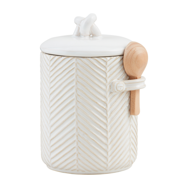 coffee canister with wooden spoon  on a white background.