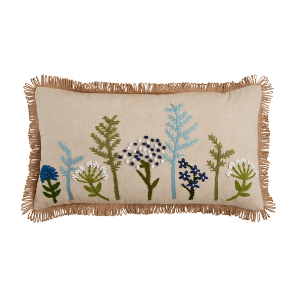 lumbar pillow with embroidered greenery in olive green, light and dark blue, and white.