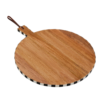 round mango wood board with black and white check rim on a white background.