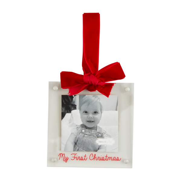 "my first christmas"  acrylic frame ornament hanging from a red velvet ribbon