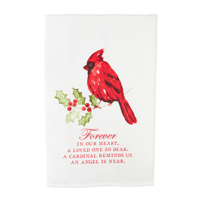 forever in our hearts white towel with image of a cardinal perched on a sprig of holly and sentiment printed in red.