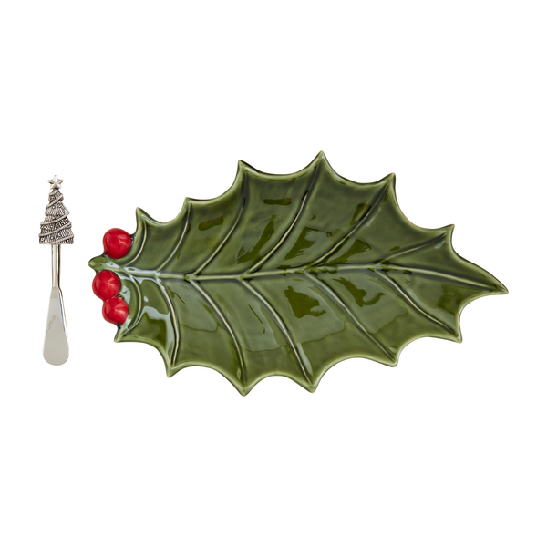 holly leaf shaped platter with tree handled spreader set next to it.