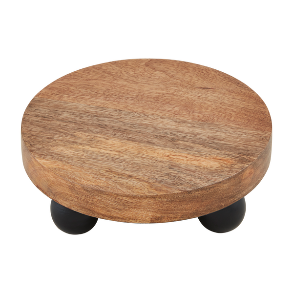 small wood riser with black bead legs.