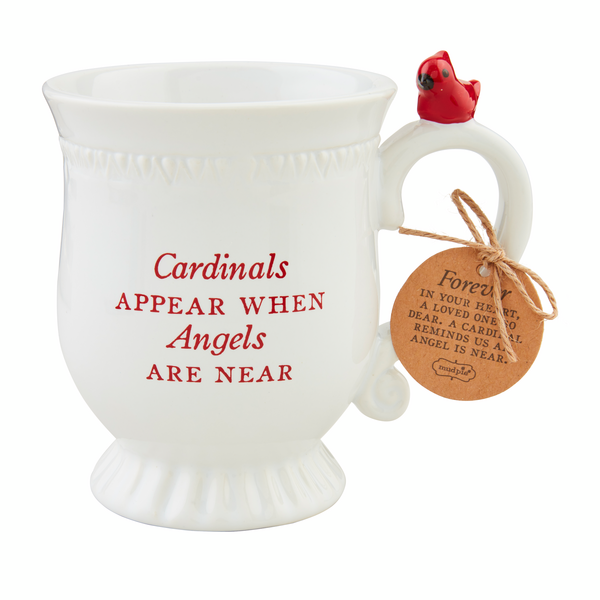 white mug with red sentiment printed on the front and a red cardinal perched on the handle.